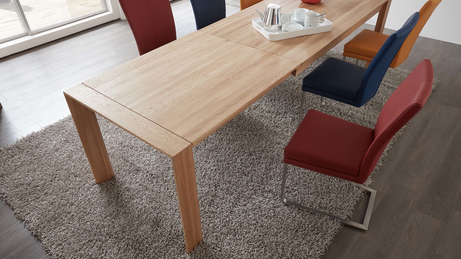 Schwingstuhl laVie aus Leder in Rot laVie Schwingstuhl bzw. Freischwinger Color-Line rubinroter Lederbezug Napoli 993 & gebürstetes Edelstahlgestell
