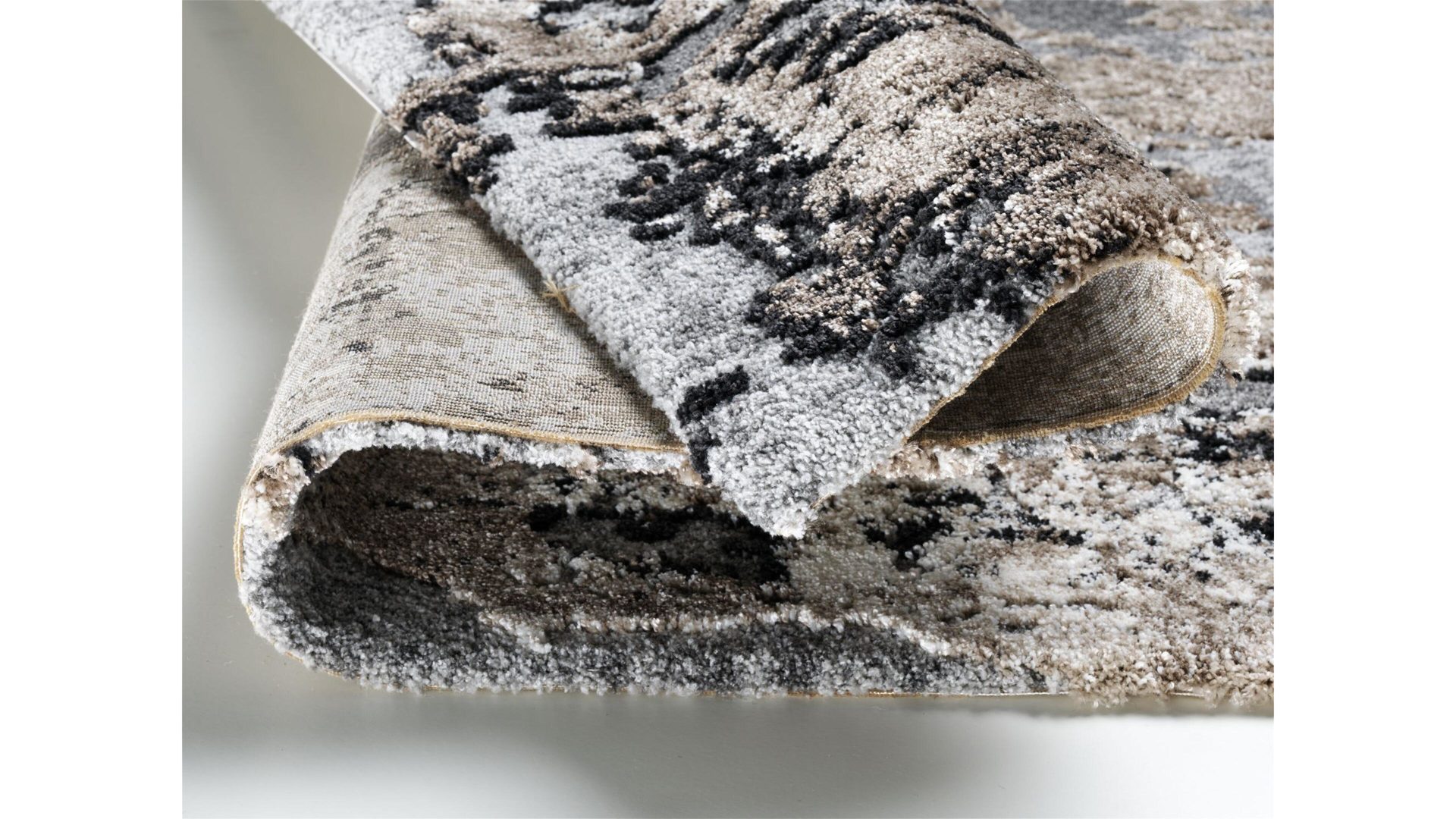 Hochflorteppich Oci aus Mischgewebe in Braun Designerteppich Juwel Liray für Ihre Wohnaccessoires braun-beiges Mischgewebe – ca. 65 x 130 cm