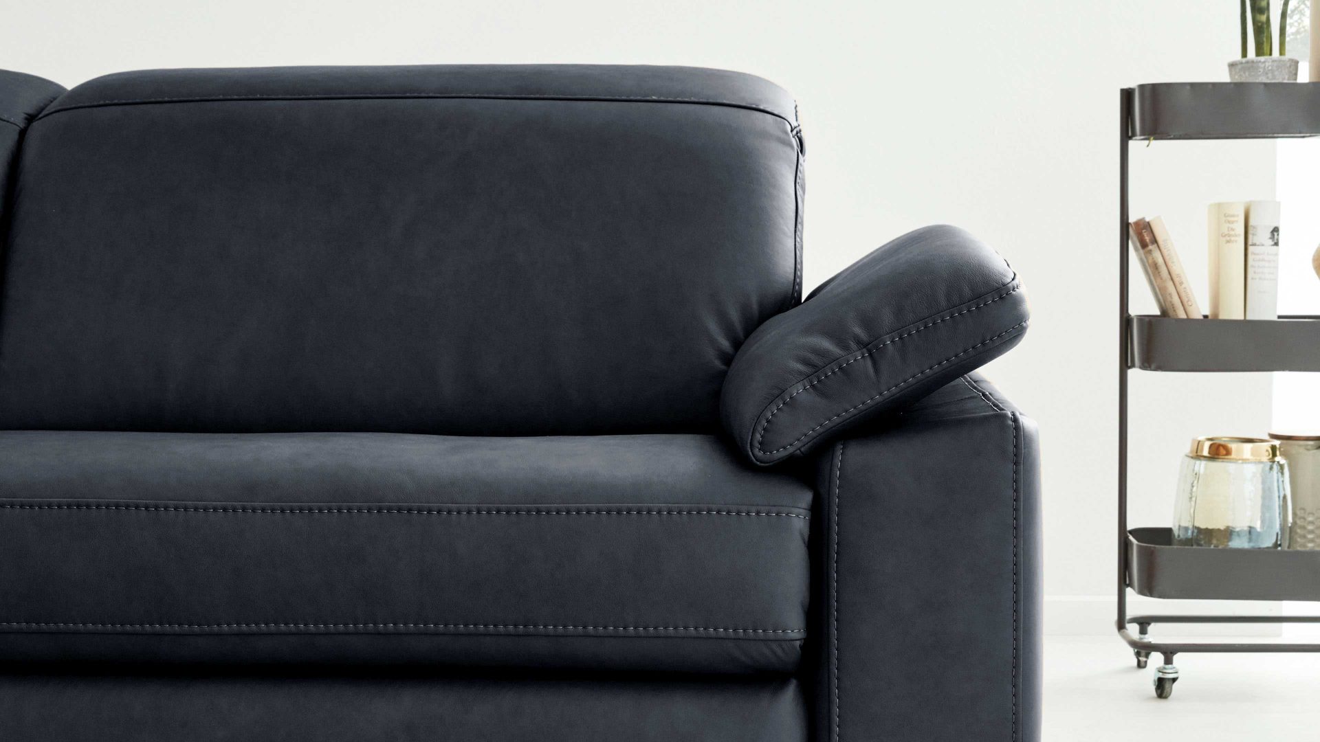 Funktion Interliving aus Metall in Transparent Interliving Sofa Serie 4054 – Armlehnverstellung AV manuelle Verstellung