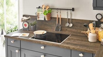 Einbauküche Nolte® küchen aus Holz in Dunkelgrau nolte® Einbauküche Windsor mit AEG-Einbaugeräten Quarzgrau & Eiche Barrique – zweizeilig