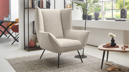 Polstersessel SOFAkultur aus Stoff in Beige SOFAkultur SK 717 - Lounge-Polstersessel sandfarbener Bezug Loop & schwarze Metallfüße 666